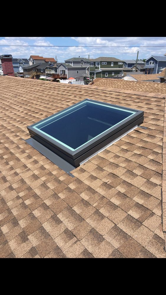New Velux skylight and Timberline shingles