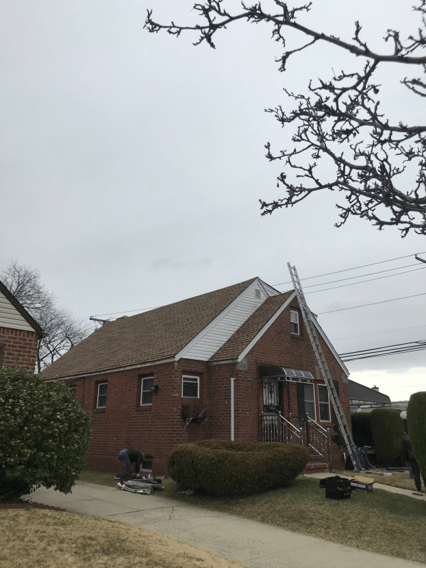 An employee at Bill White Roofing & Waterproofing